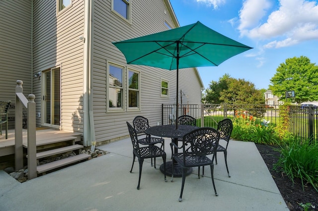 583 Marhurst Ct, Galloway, OH 43119 - view of patio / terrace featuring outdoor dining area and a deck