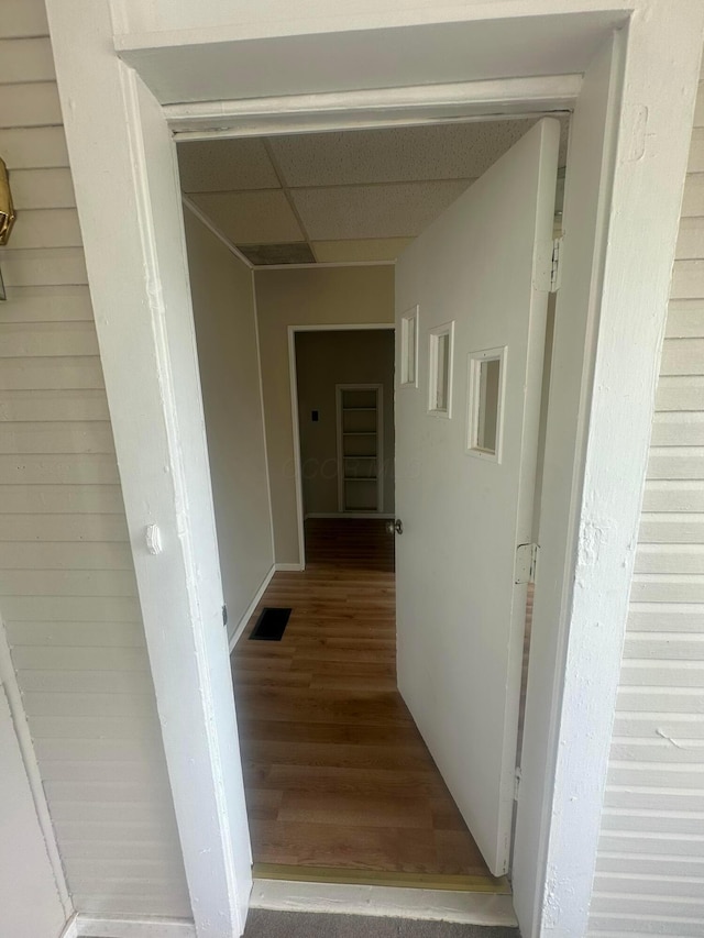 600 N Maple St, Lancaster, OH 43130 - hallway with wood finished floors and a paneled ceiling
