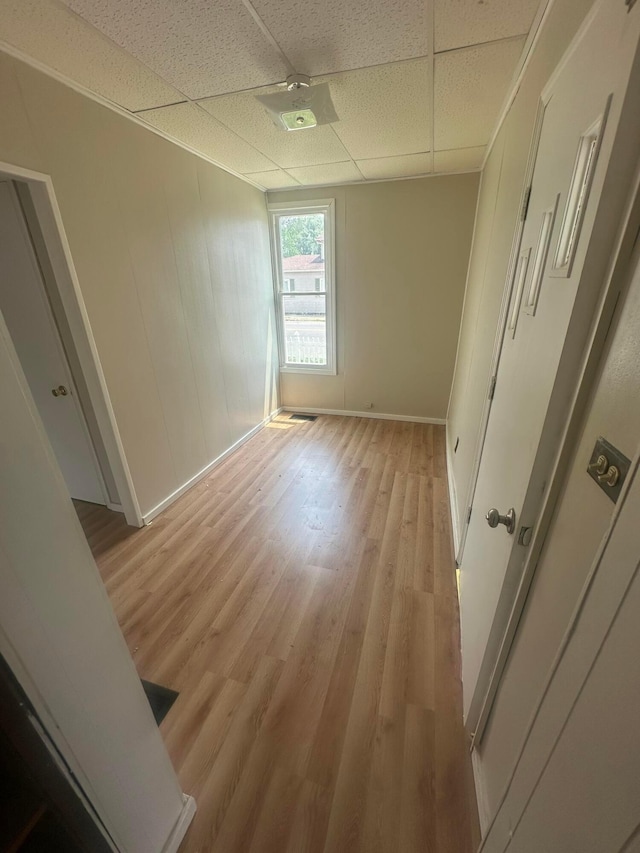 600 N Maple St, Lancaster, OH 43130 - empty room with a paneled ceiling, light wood-style floors, and baseboards