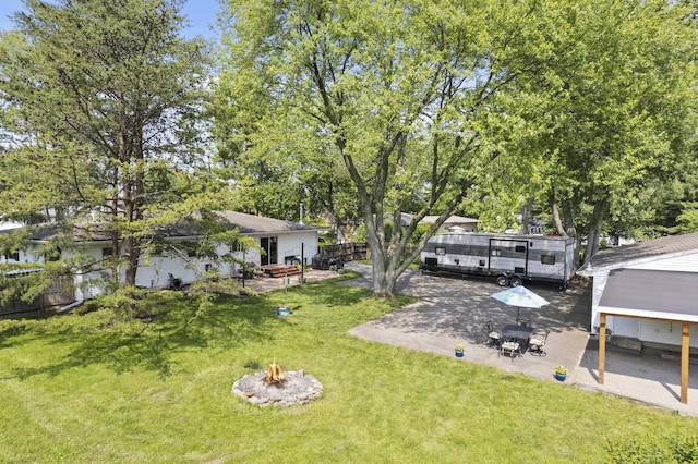 2147 Summit View Rd, Powell, OH 43065 - view of yard featuring an outdoor fire pit and a patio