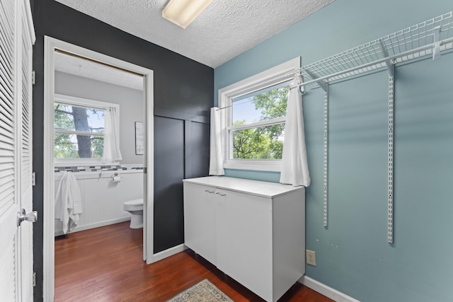 2147 Summit View Rd, Powell, OH 43065 - walk in closet with dark wood-style floors