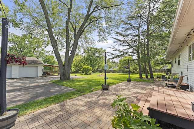 2147 Summit View Rd, Powell, OH 43065 - view of patio / terrace with an outbuilding and a garage