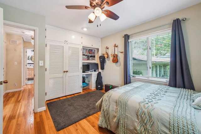2171 Northam Rd, Columbus, OH 43221 - bedroom with a closet, light wood-style floors, a ceiling fan, and baseboards