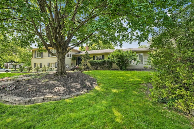 2171 Northam Rd, Columbus, OH 43221 - view of front of house featuring a front lawn and a chimney