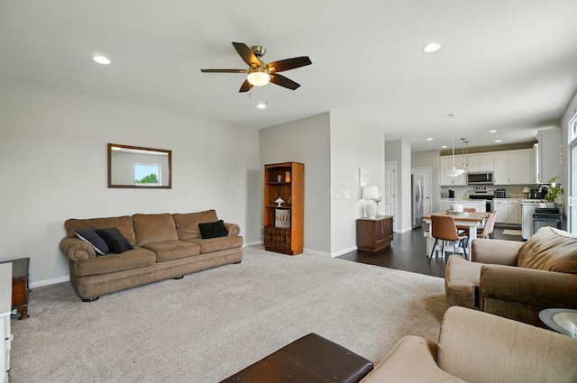 560 Green Forest Pl, Lithopolis, OH 43136 - living area with ceiling fan, recessed lighting, and dark colored carpet