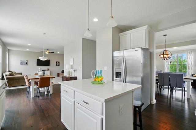 560 Green Forest Pl, Lithopolis, OH 43136 - kitchen featuring stainless steel refrigerator with ice dispenser, dark wood finished floors, ceiling fan, a kitchen island, and white cabinets