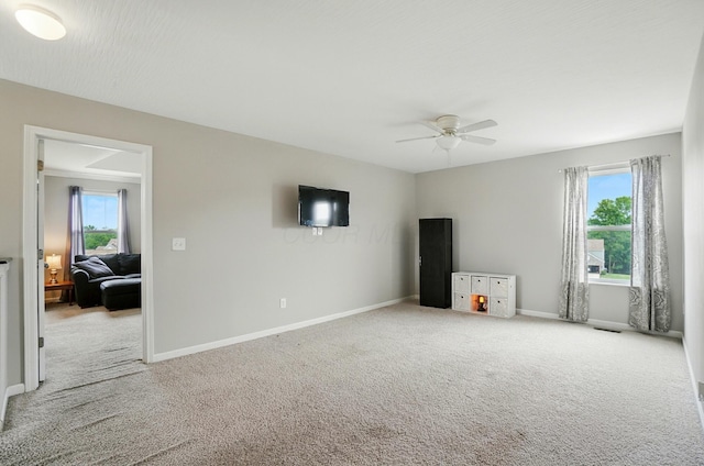 560 Green Forest Pl, Lithopolis, OH 43136 - spare room with plenty of natural light, carpet flooring, and ceiling fan