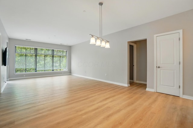250 Daniel Burnham Sq Unit 304, Columbus, OH 43215 - empty room with light wood-style floors