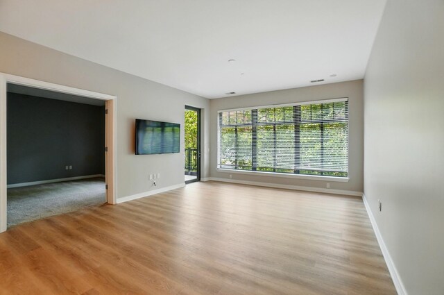 250 Daniel Burnham Sq Unit 304, Columbus, OH 43215 - empty room with light wood finished floors