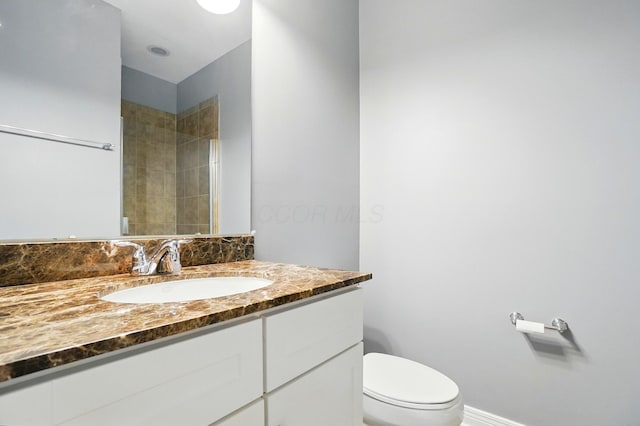 250 Daniel Burnham Sq Unit 304, Columbus, OH 43215 - full bathroom featuring vanity and tiled shower