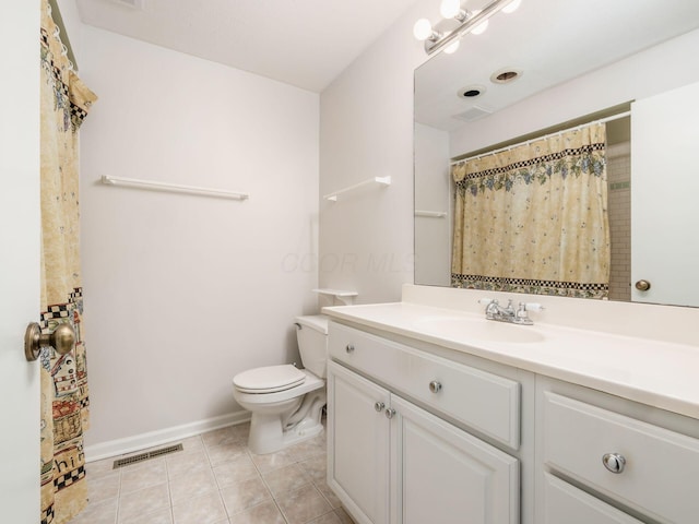 3120 Walden Ravines, Columbus, OH 43221 - bathroom with vanity, toilet, tile patterned floors, and baseboards