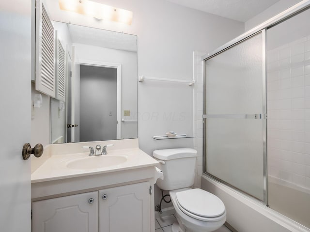 3120 Walden Ravines, Columbus, OH 43221 - bathroom featuring toilet, vanity, and combined bath / shower with glass door