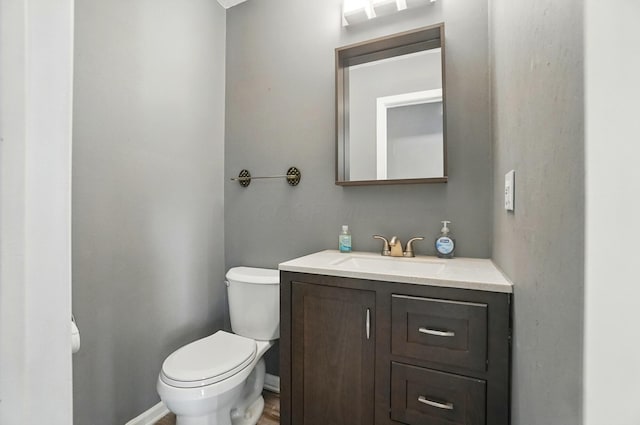 2605 Bella Via Ave, Columbus, OH 43231 - half bath featuring vanity, toilet, and baseboards