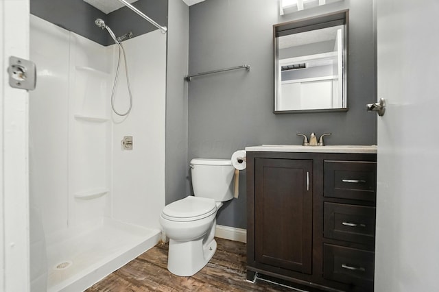 2605 Bella Via Ave, Columbus, OH 43231 - full bath with a shower, toilet, wood finished floors, vanity, and baseboards