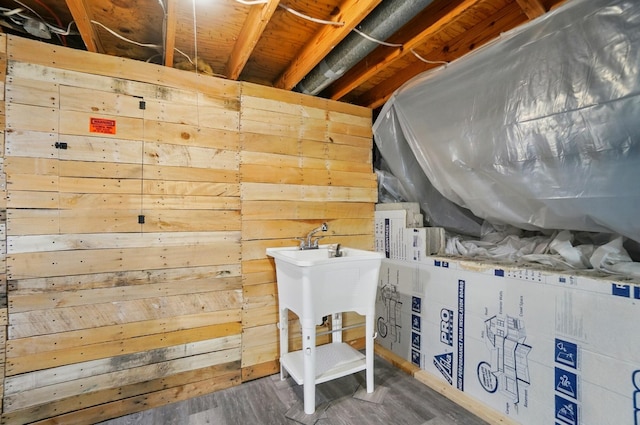 2605 Bella Via Ave, Columbus, OH 43231 - unfinished basement with wooden walls and wood finished floors