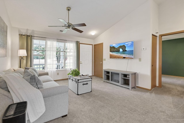 1318 Hillview Cir E, Newark, OH 43055 - living room with vaulted ceiling, a ceiling fan, light carpet, and baseboards