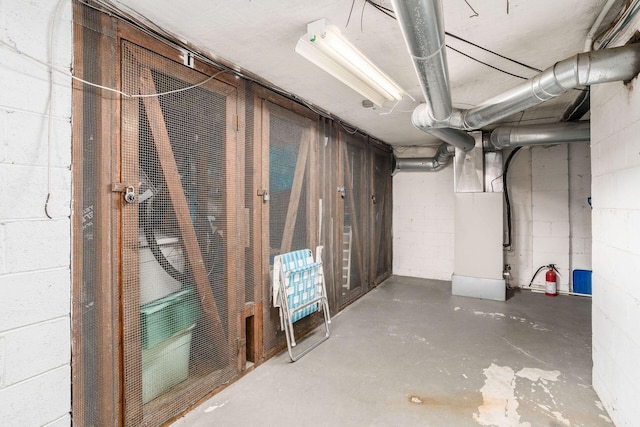1775 NW Ct Unit 114 J, Columbus, OH 43212 - unfinished basement with concrete block wall and heating unit