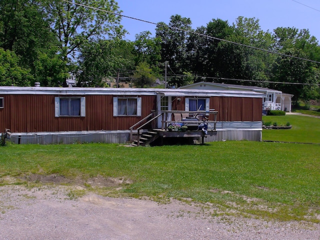 8190 New Marshfield Rd, New Marshfield, OH 45766 - manufactured / mobile home with a front lawn