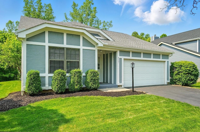 4557 Hidden Ridge Ct, Columbus, OH 43230 - view of front facade featuring an attached garage, stucco siding, driveway, a front yard, and a shingled roof