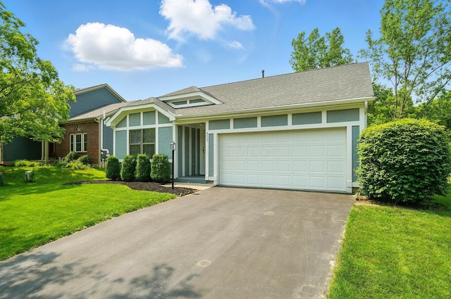 4557 Hidden Ridge Ct, Columbus, OH 43230 - mid-century inspired home with driveway, an attached garage, a front lawn, and a shingled roof