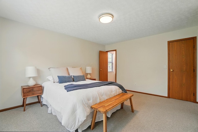 4557 Hidden Ridge Ct, Columbus, OH 43230 - bedroom featuring light colored carpet, baseboards, and a textured ceiling