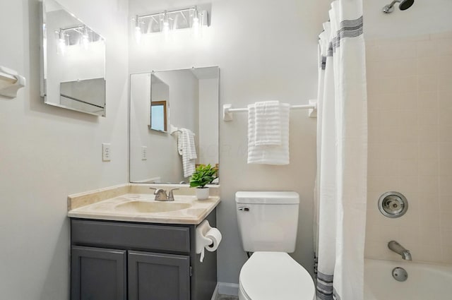 4557 Hidden Ridge Ct, Columbus, OH 43230 - bathroom featuring vanity, toilet, and shower / tub combo with curtain