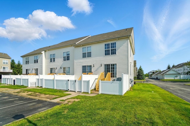 5629 Middle Falls St, Dublin, OH 43016 - back of property with uncovered parking and a residential view
