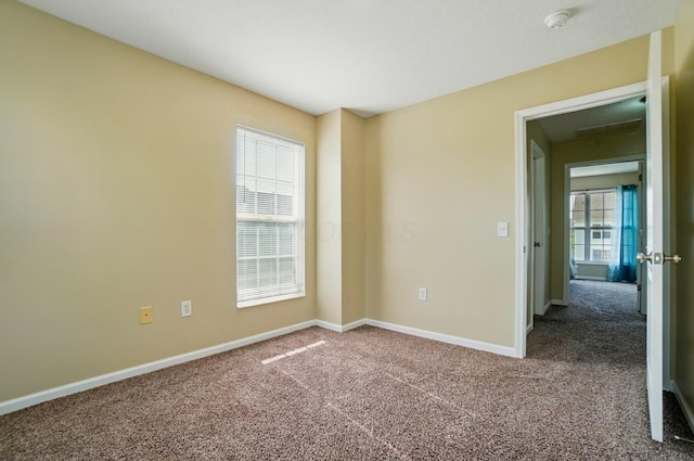 5629 Middle Falls St, Dublin, OH 43016 - unfurnished room with a smoke detector and carpet