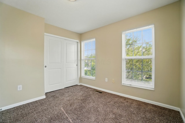 5629 Middle Falls St, Dublin, OH 43016 - unfurnished bedroom with carpet and a closet