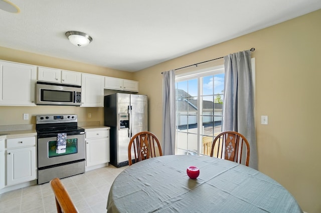 5629 Middle Falls St, Dublin, OH 43016 - kitchen with appliances with stainless steel finishes, white cabinets, and light countertops
