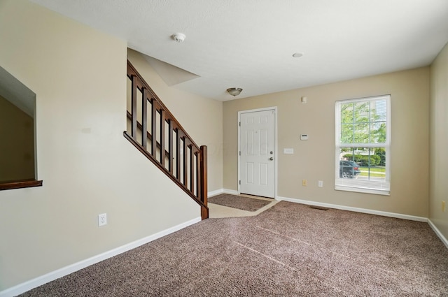 5629 Middle Falls St, Dublin, OH 43016 - foyer entrance featuring carpet floors and stairs