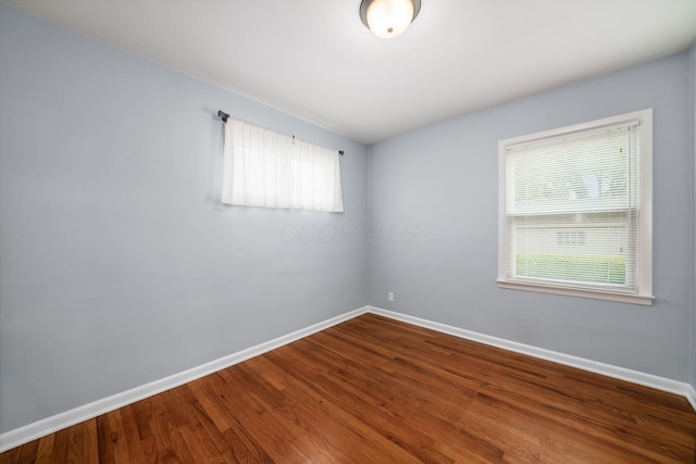 677 E Weisheimer Rd, Columbus, OH 43214 - spare room featuring healthy amount of natural light, baseboards, and wood finished floors