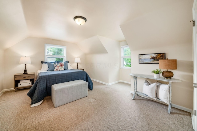 677 E Weisheimer Rd, Columbus, OH 43214 - bedroom featuring carpet floors, lofted ceiling, multiple windows, and baseboards