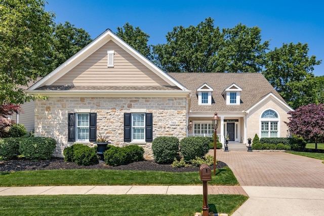 7908 Coldwater Dr, Powell, OH 43065 - view of front facade featuring stone siding