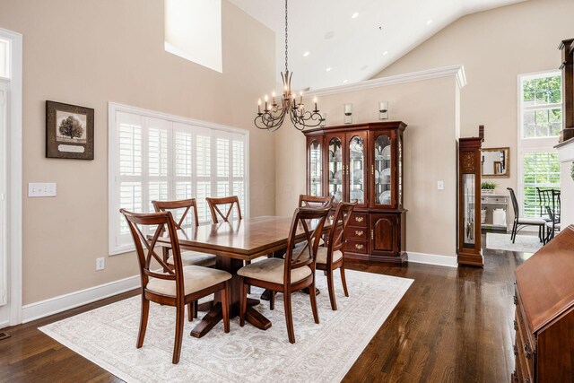 7908 Coldwater Dr, Powell, OH 43065 - dining space featuring high vaulted ceiling, a chandelier, and dark wood finished floors