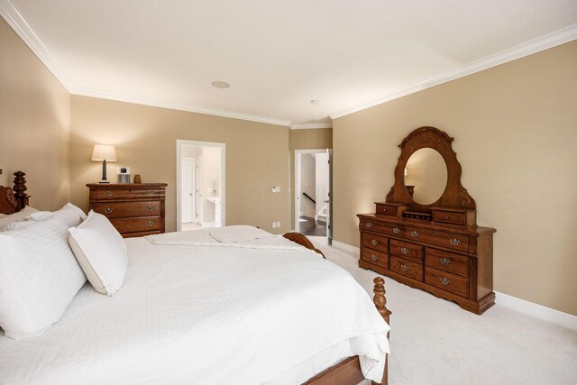 7908 Coldwater Dr, Powell, OH 43065 - bedroom with crown molding, light colored carpet, and connected bathroom