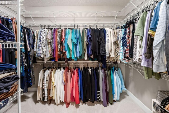 7908 Coldwater Dr, Powell, OH 43065 - walk in closet with carpet flooring