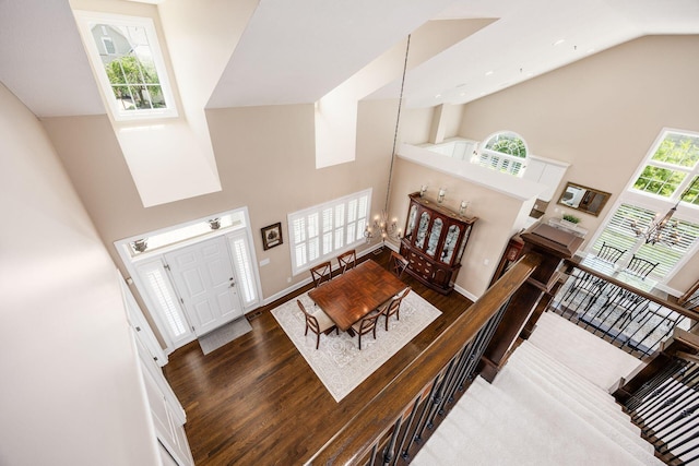 7908 Coldwater Dr, Powell, OH 43065 - entryway featuring high vaulted ceiling and wood finished floors