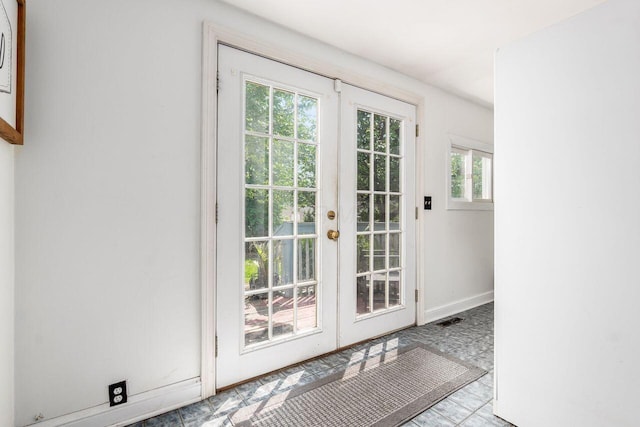 369 E Main St, Circleville, OH 43113 - doorway featuring french doors and baseboards
