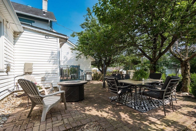 369 E Main St, Circleville, OH 43113 - view of patio with outdoor dining area and a fire pit