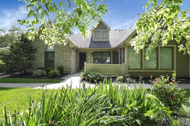 53 Stone House Ct, Newark, OH 43055 - view of front of home featuring stone siding and roof with shingles