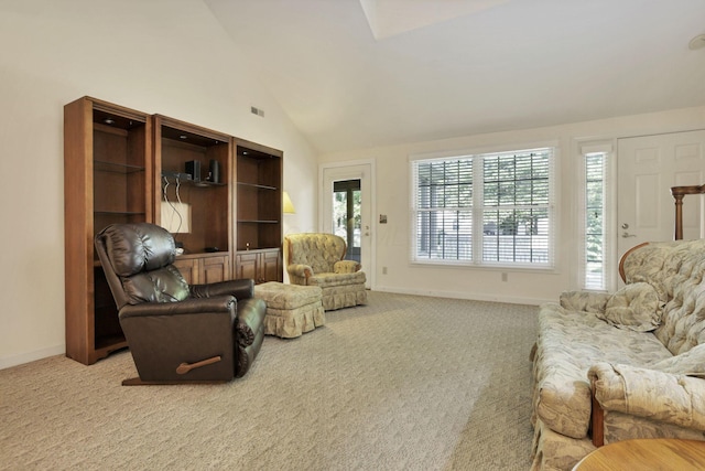 53 Stone House Ct, Newark, OH 43055 - living area featuring baseboards, light colored carpet, and high vaulted ceiling