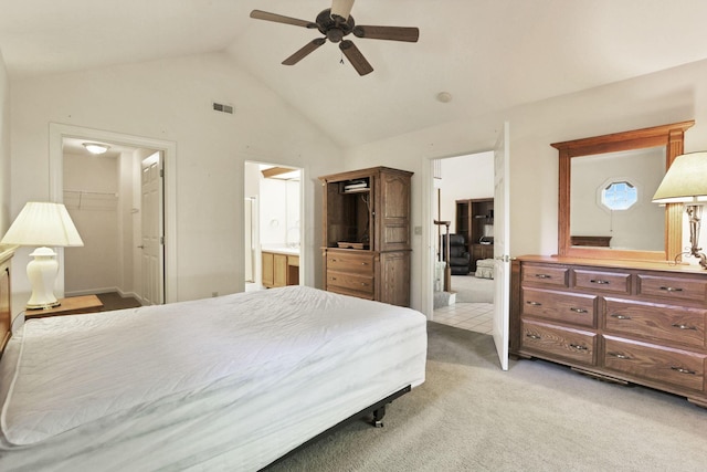 53 Stone House Ct, Newark, OH 43055 - bedroom with lofted ceiling, light colored carpet, a walk in closet, a ceiling fan, and connected bathroom