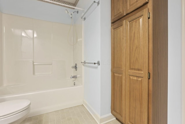 53 Stone House Ct, Newark, OH 43055 - bathroom with shower / bathtub combination, toilet, and baseboards