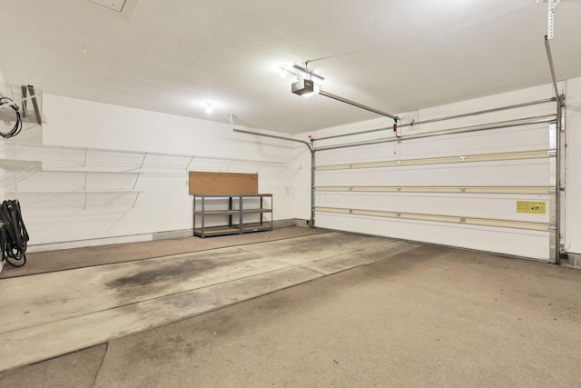 53 Stone House Ct, Newark, OH 43055 - garage featuring a garage door opener