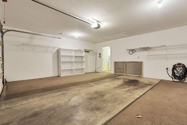 53 Stone House Ct, Newark, OH 43055 - garage featuring a garage door opener