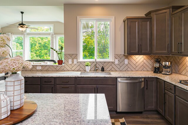 829 Pathlow Dr, Pickerington, OH 43147 - kitchen with stainless steel dishwasher, ceiling fan, backsplash, dark wood-type flooring, and dark brown cabinets
