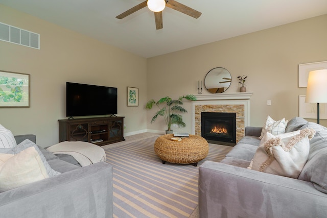 829 Pathlow Dr, Pickerington, OH 43147 - carpeted living room with ceiling fan and a fireplace