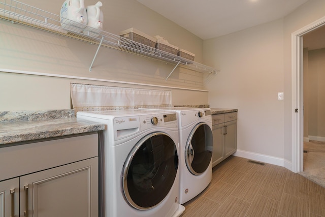 829 Pathlow Dr, Pickerington, OH 43147 - laundry area with washing machine and dryer and cabinet space