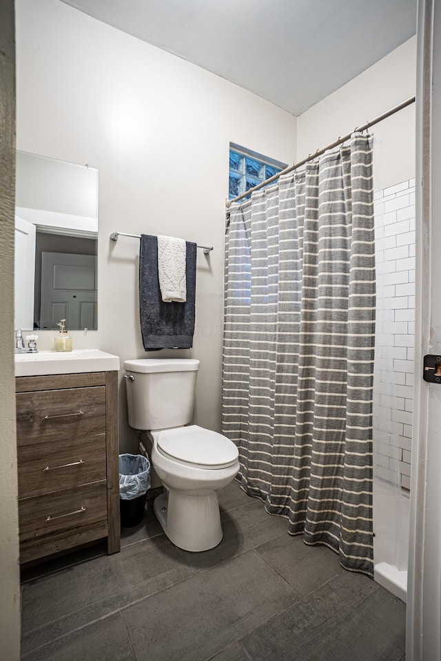 382 Carpenter St, Columbus, OH 43205 - bathroom featuring toilet, vanity, and a shower with curtain